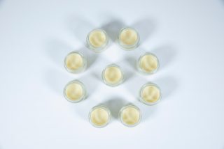 Care balm isolated on a white background in flower shape
