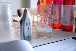 mixer and laboratory glass for natural cosmetics mixing formula