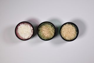 three emulsifiers and waxes for natural cosmetics on white background