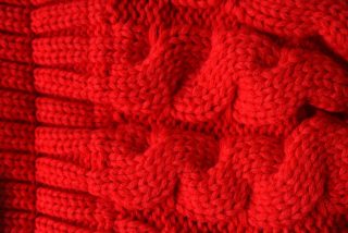 Knitted red wool texture