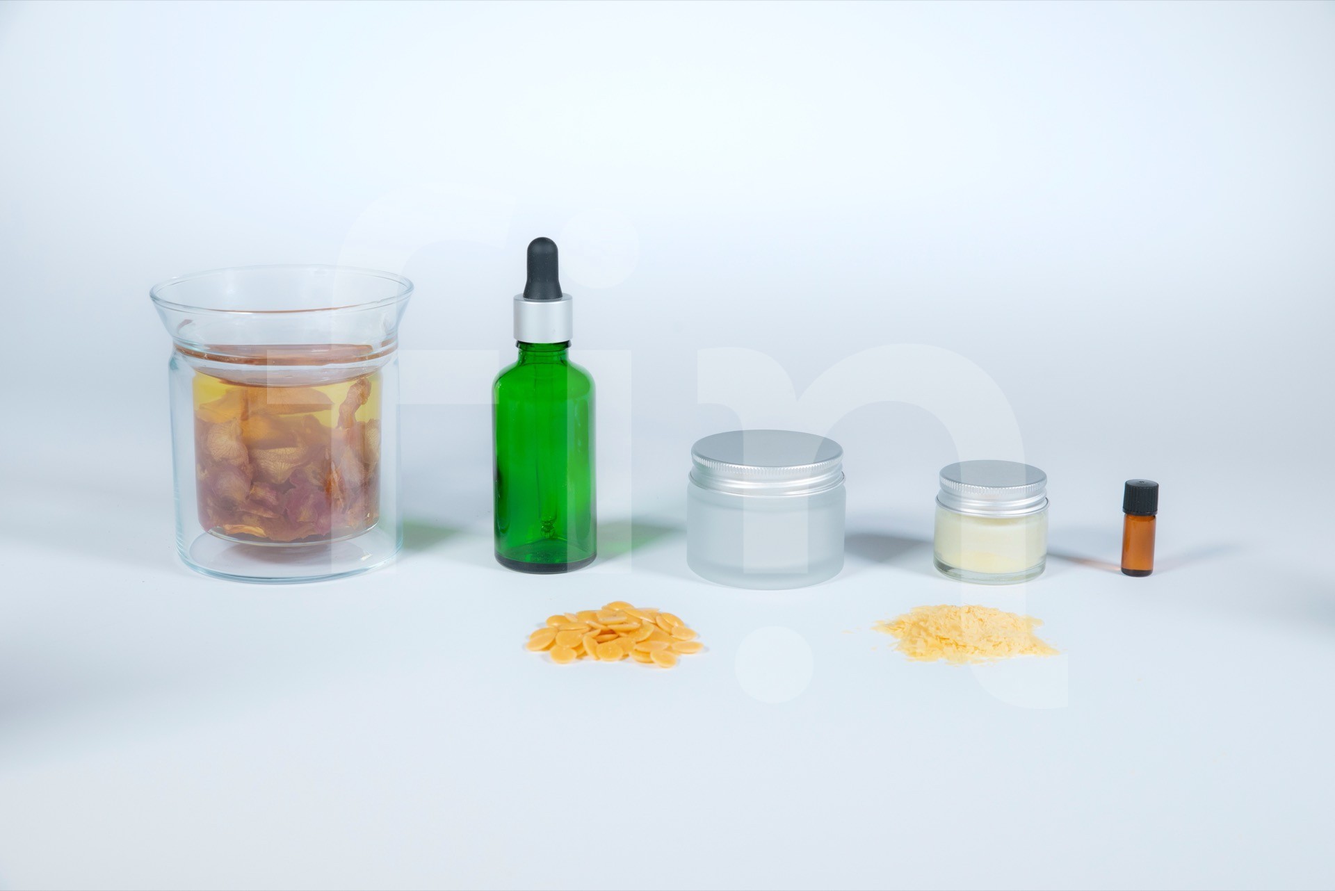 Packaging and material for natural cosmetics on a white background