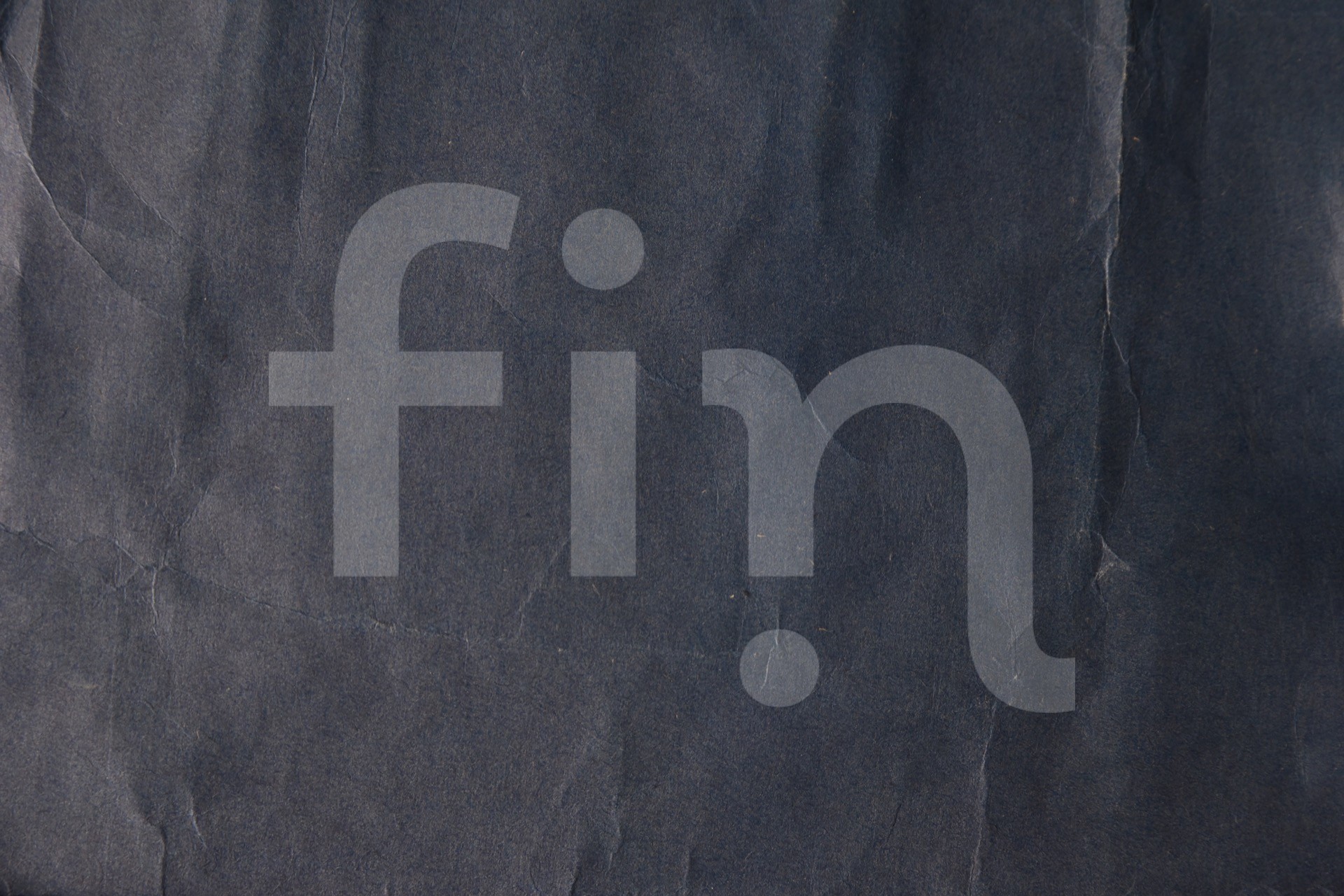 Texture of a surface of dark blue paper