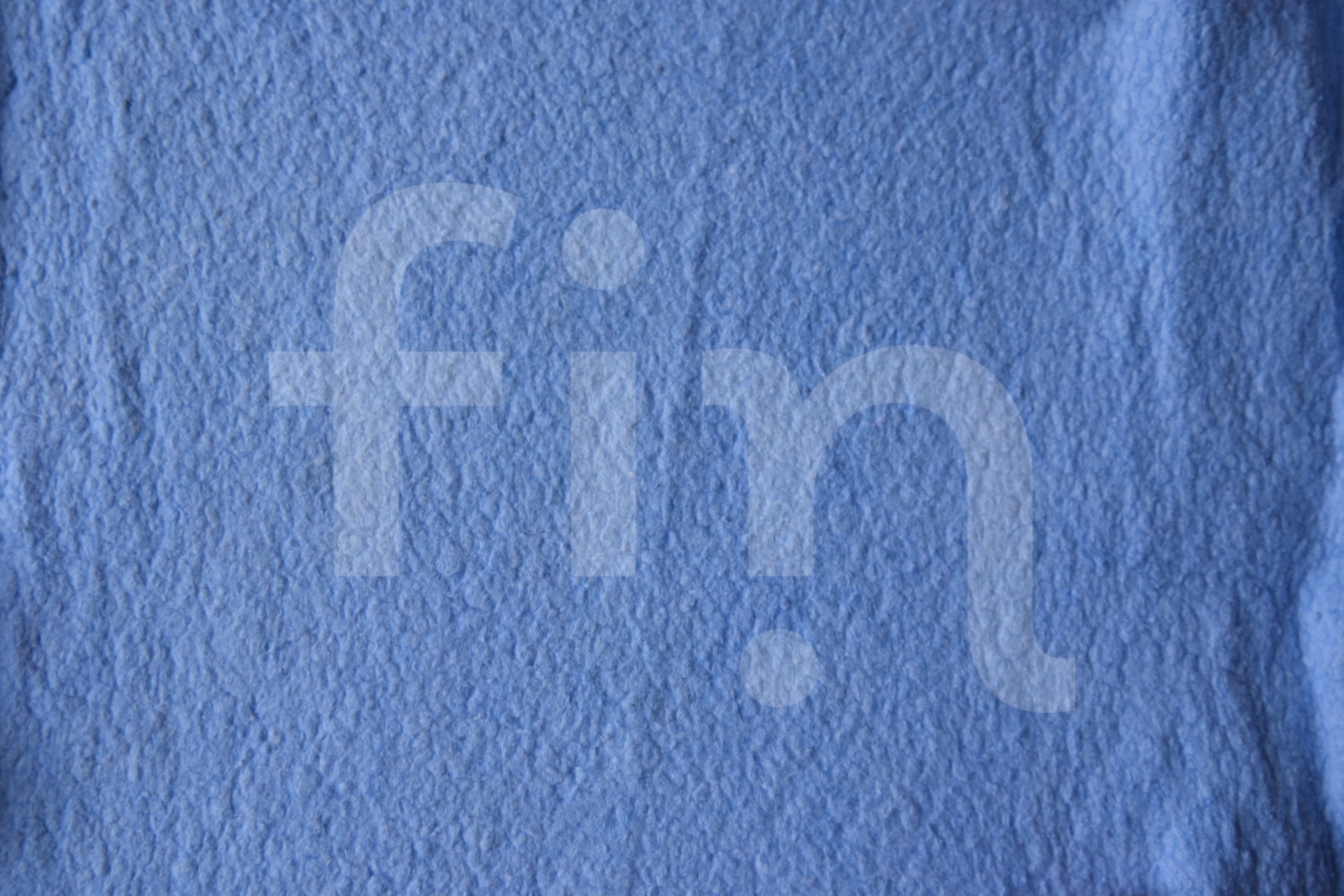 Texture of light blue cleaning cloth