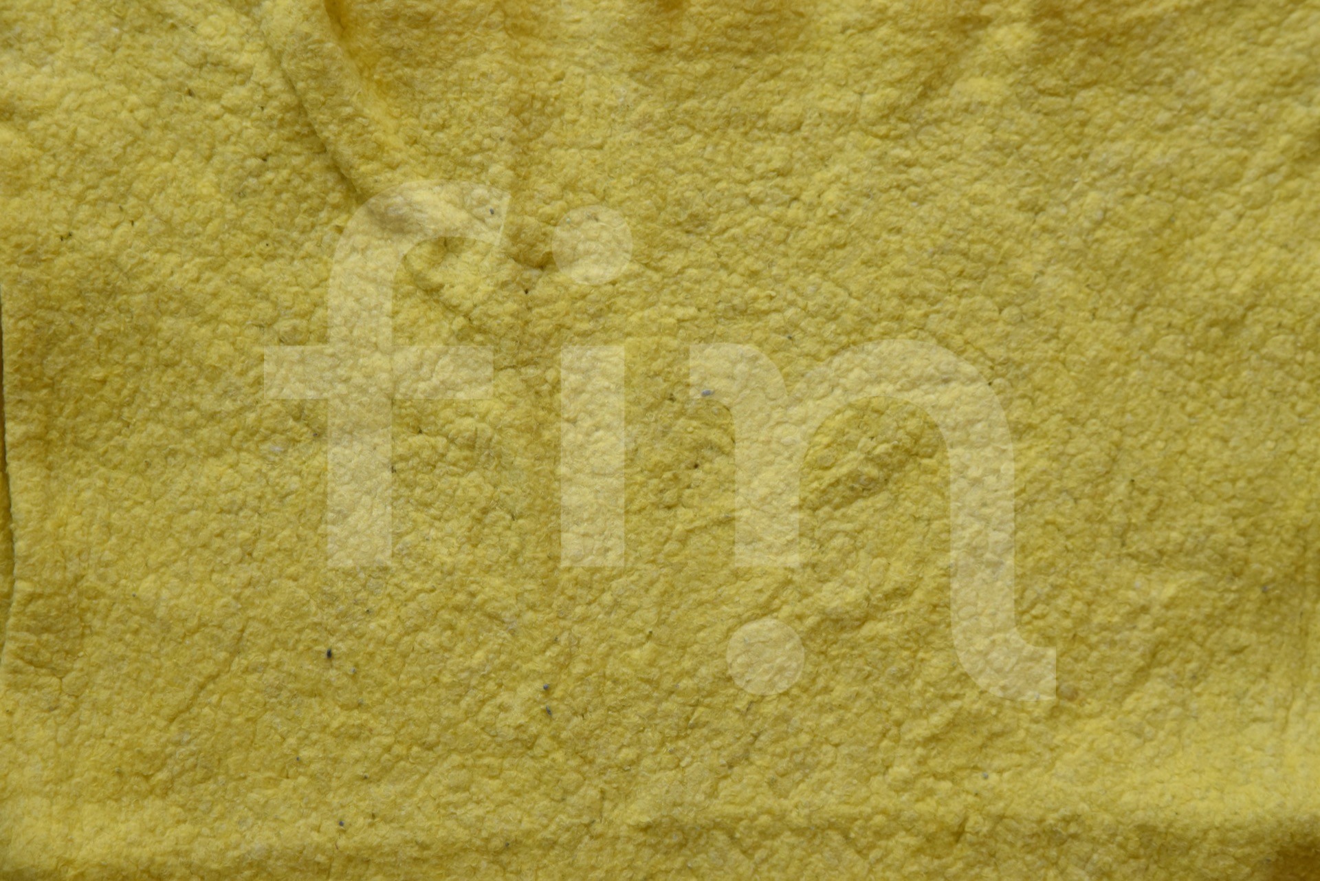 Texture of yellow cleaning cloth