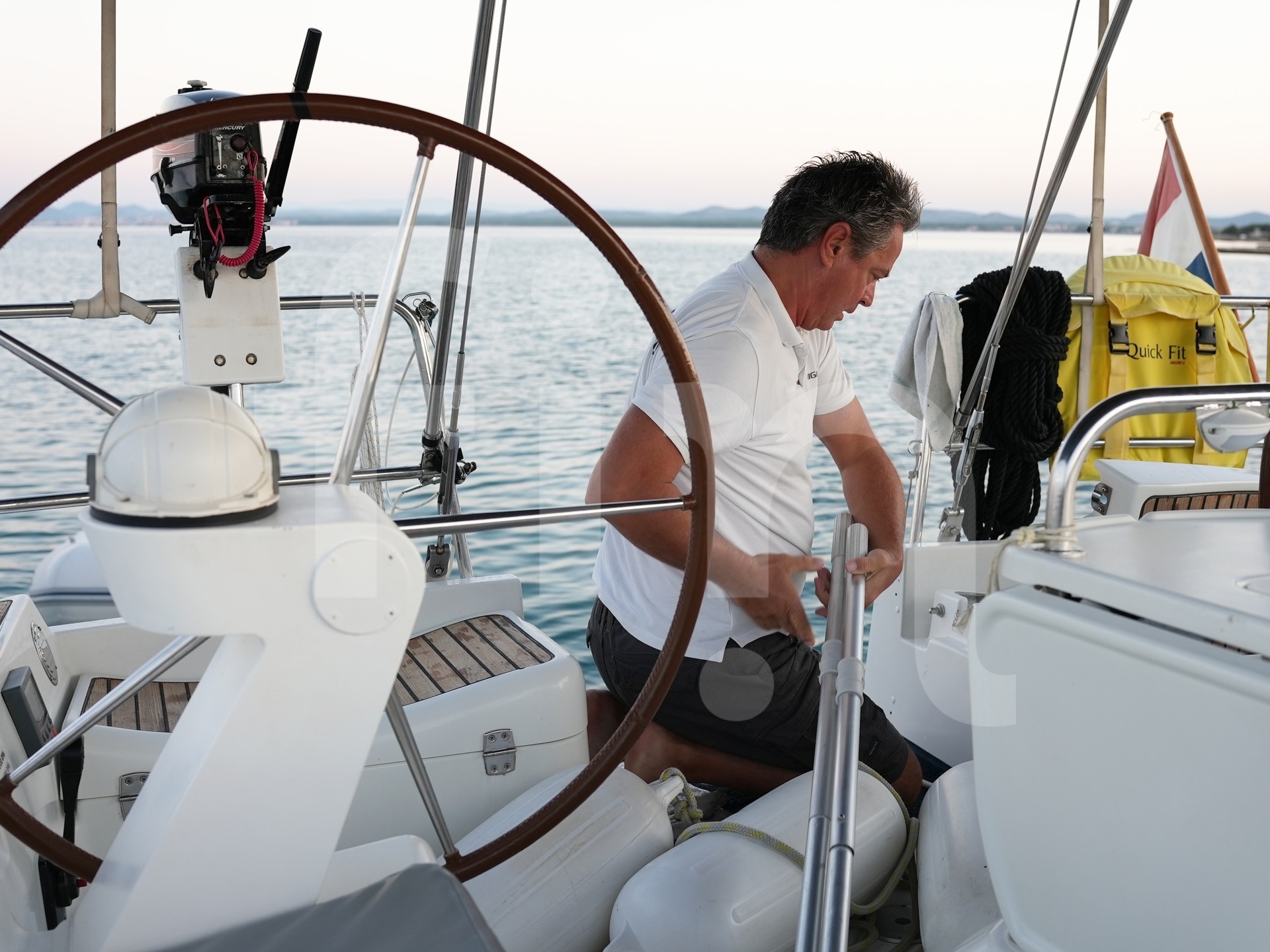 theSkipper on the sailboat clears the oars