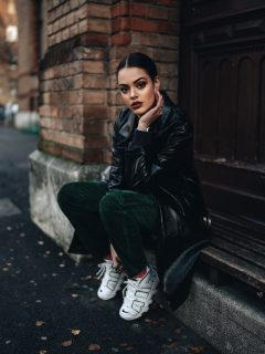 Black coat fashion girl with sunglasses and dark makeup