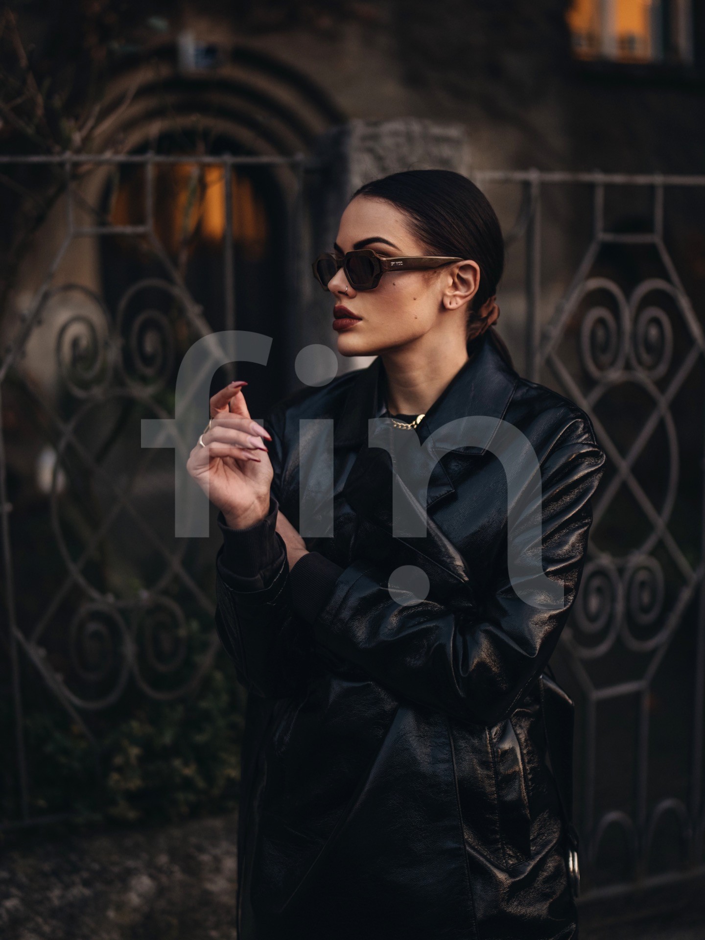 Black coat fashion girl with sunglasses and dark makeup