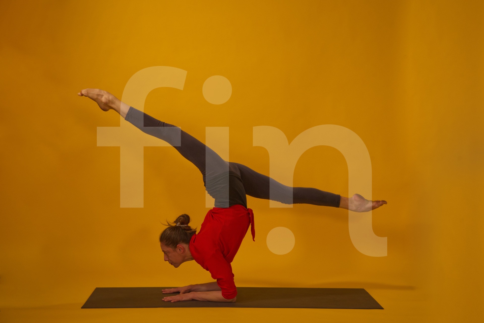 Yoga pose Vrischikasana Scorpion with stretched legs