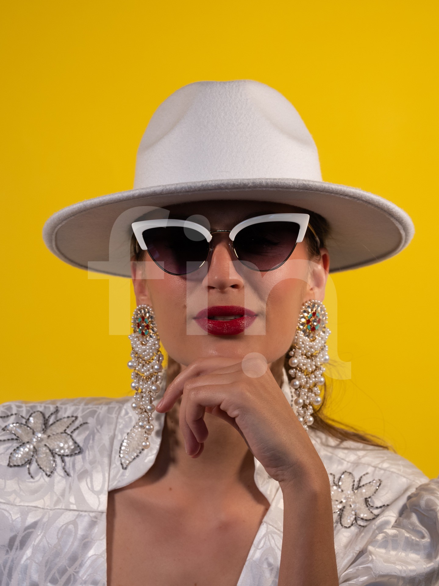 White style girl with sunglasses on yellow background