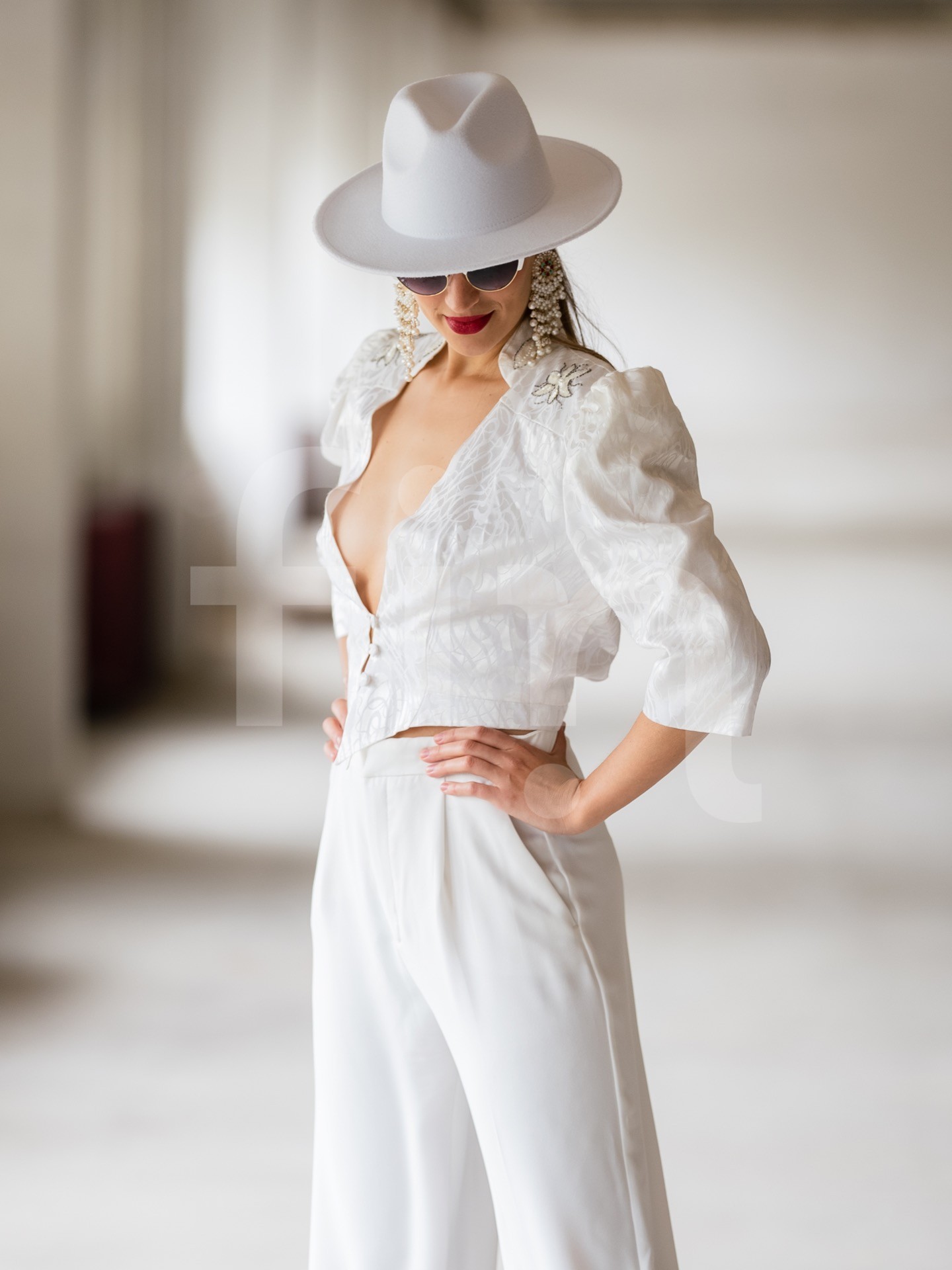 White toreador styling girl with hat