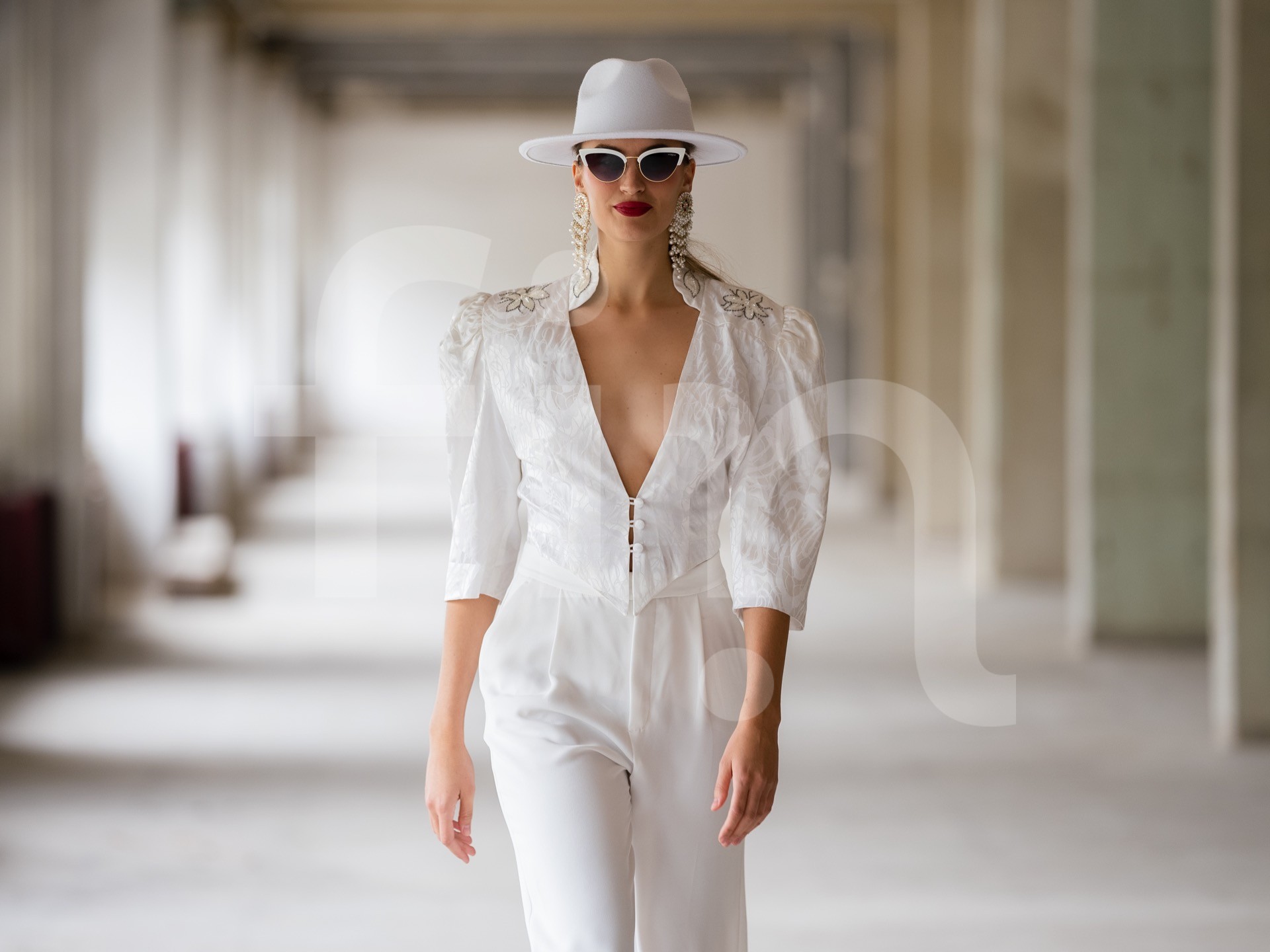White toreador styling girl with hat