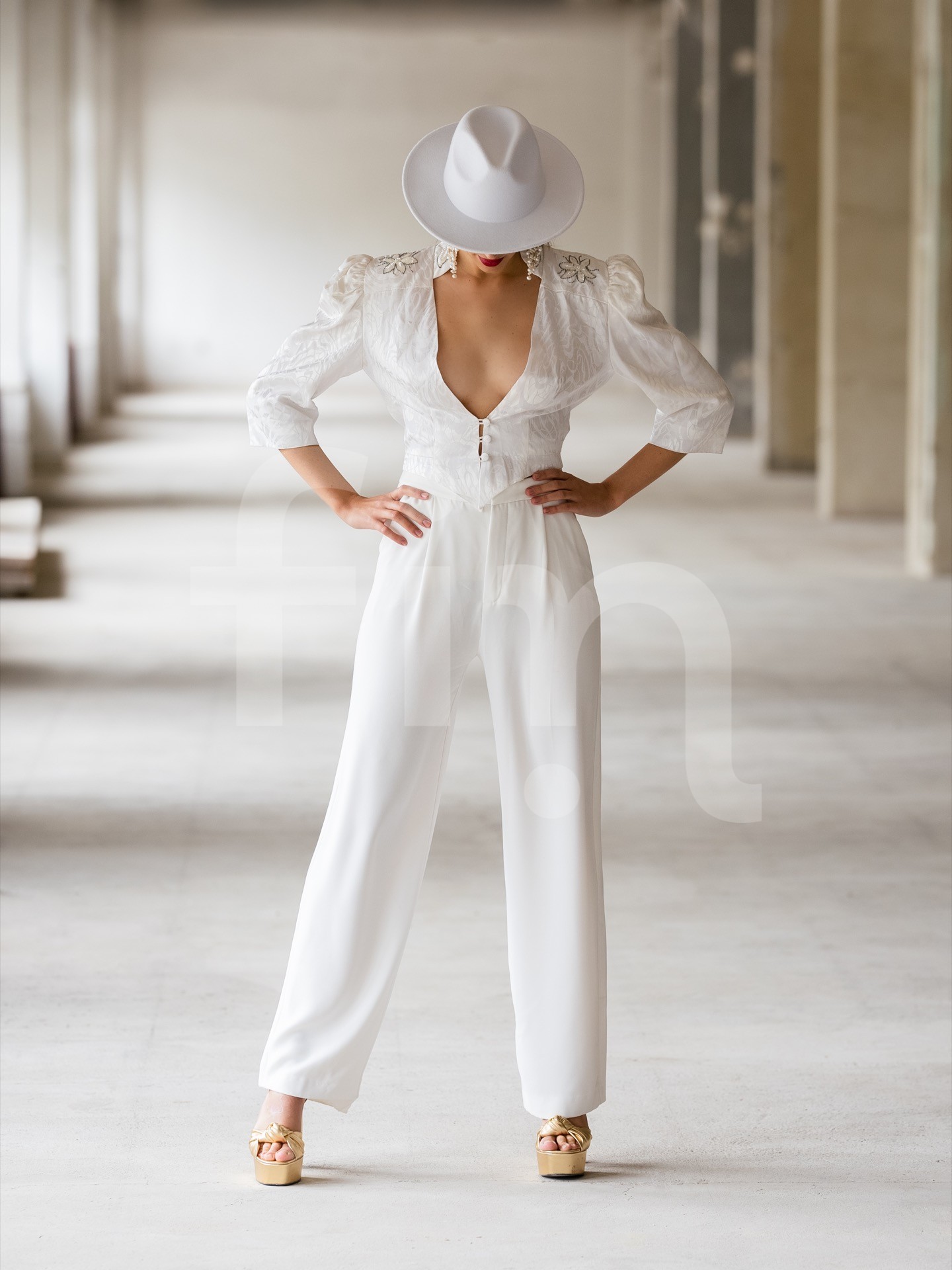 White toreador styling girl with hat