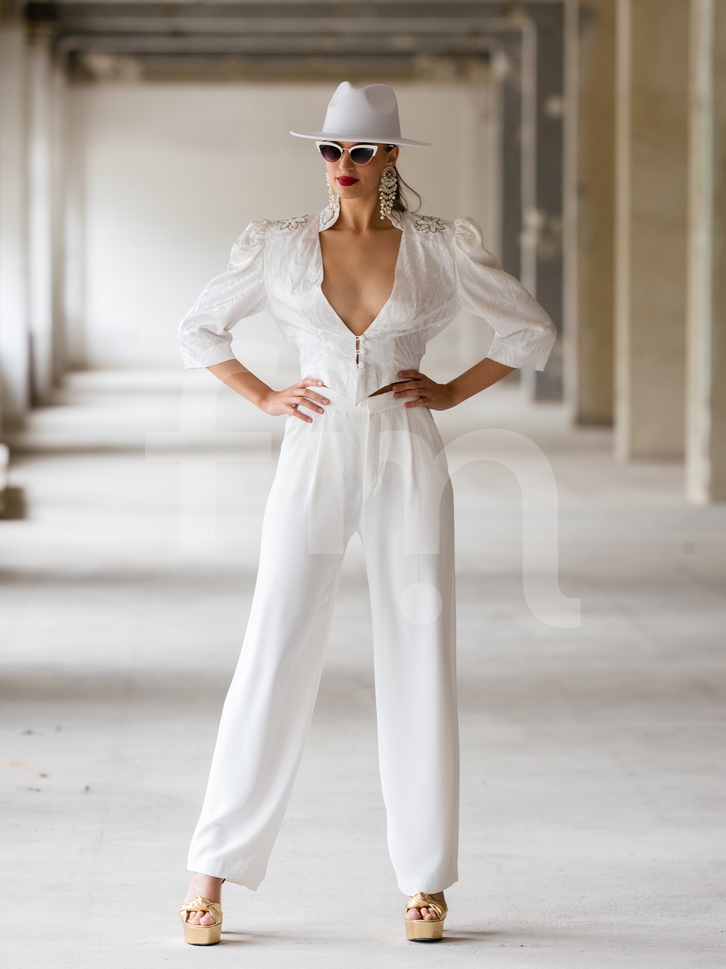 White toreador styling girl with hat